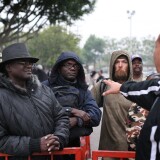 LOS ANGELES, CA - APRIL 27:  People who waited in a pre-dawn line without entry wristbands, are told that no more wristbands will be issued until the following day at the Remote Area Medical (RAM) clinic at the Los Angeles Sports Arena on April 27, 2010 in Los Angeles, California. More than 6,000 people were given wristbands over the weekend, some of them waiting overnight, to receive the free medical, dental and vision care. RAM hopes to treat 8,400 patients at the event which runs from April 27 to  May 3. A Los Angeles-area RAM event in 2009 provided more than 14,500 services to approximately 6,344 patients. Los Angeles is reportedly home to 2.2 million uninsured people.  (Photo by David McNew/Getty Images)