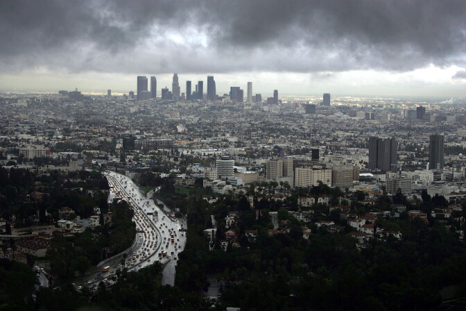 LOS ANGELES - FEBRUARY 22: Downtown Los Angeles (top) and Hollywood (R) are visible during a short break in the rain as the region is under a tornado watch and Orange County is under a tornado warning February 22, 2005 in Los Angeles, California. This is now the third wettest season on record for southern California and with two months left in the season, it could become the rainiest since records began in 1877. (Photo by David McNew/Getty Images)

