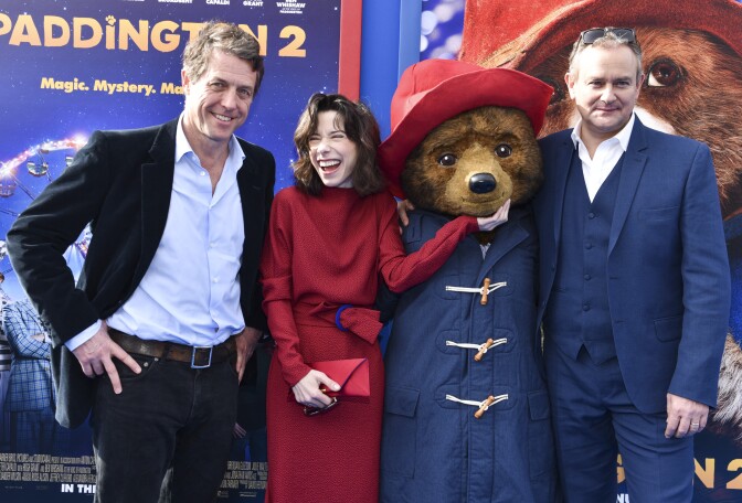 WESTWOOD, CA - JANUARY 06:  (L-R) Actors Hugh Grant, Sally Hawkins, and Hugh Bonneville arrive at the premiere of Warner Bros. Pictures' "Paddington 2" at Regency Village Theatre on January 6, 2018 in Westwood, California.  (Photo by Rodin Eckenroth/Getty Images)