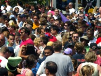 ANAHEIM, CA - JULY 15: Crowds gather outside the re-launch ceremony of Disneyland's Space Mountain attraction at Disneyland on July 15, 2005 in Anaheim, California. Space Mountain has been closed since April 2003 for renovations.  (Photo by Matthew Simmons/Getty Images)