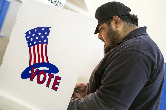 Juan Alonso of El Sereno votes at a polling place inside Barrio Action Youth & Family Center on Tuesday afternoon, June 7, 2016 during the California primary election. "You just have to vote. If you don't vote, then don't complain," he said.