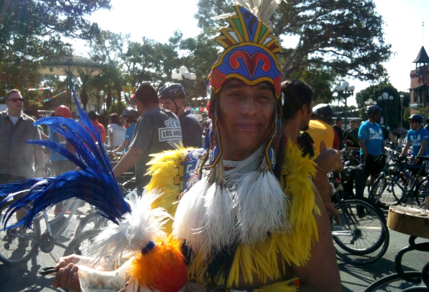 Lazaro Arvizu, in Aztec garb, at the beginning of the city's 6th CicLAvia event, held on Sunday, April 21, 2013.