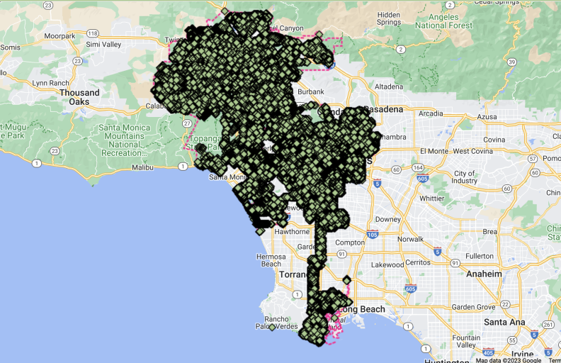 An outlined map of the the city of Los Angeles has green dots throughout.