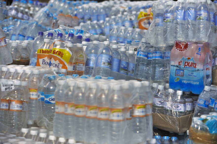 Bottled water to be sent to Haiti on January 15, 2010 at the Zocalo Square, in Mexico City. Planeloads of rescuers and relief supplies headed to Haiti as governments and aid agencies launched a massive relief operation after a powerful earthquake that may have killed thousands. AFP PHOTO/Alfredo Estrella (Photo credit should read ALFREDO ESTRELLA/AFP/Getty Images)