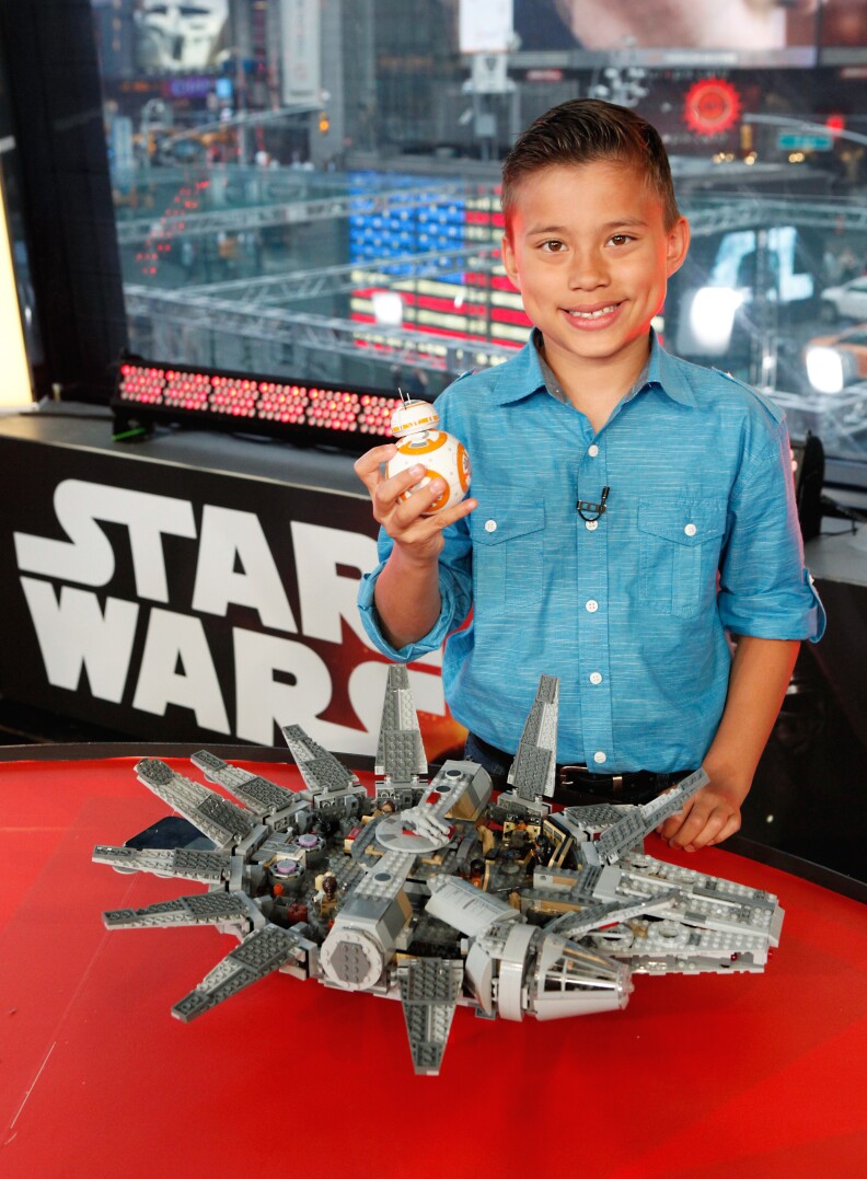 A fan with LEGO Star Wars Millennium Falcon and Star Wars BB-8 from Sphero at a live unboxing event on "Good Morning America" TV show in New York City on Sept. 3, 2015.