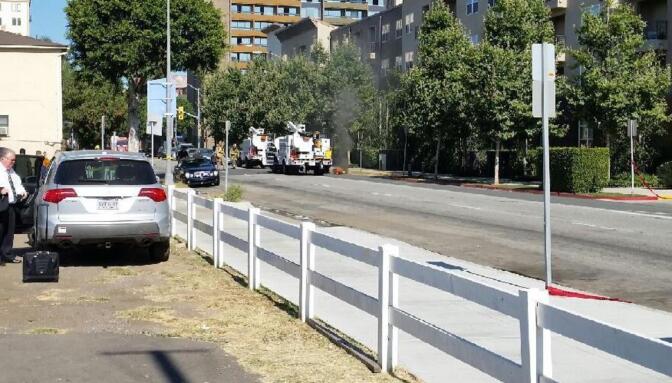 Smoke coming out of a manhole in Long Beach on Wednesday, July 15, 2015.