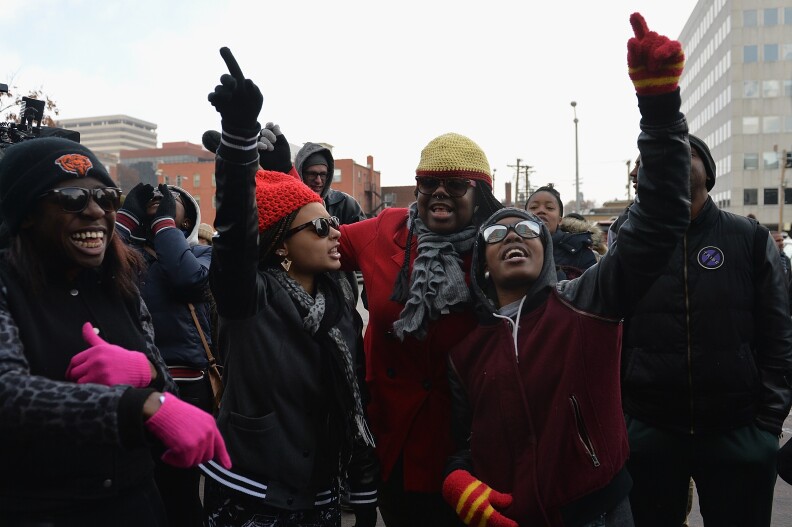 Demonstrators march during a peaceful protest November 17, 2014 streets in Clayton, Missouri. The governor of the US state of Missouri declared a state of emergency Monday and activated the National Guard ahead of a grand jury decision in the case of a black teenager shot and killed by a white police officer. Many fear an outbreak of violence if the St Louis County grand jury fails to indict Ferguson city police officer Darren Wilson in the August 9 death of 18-year-old Michael Brown.