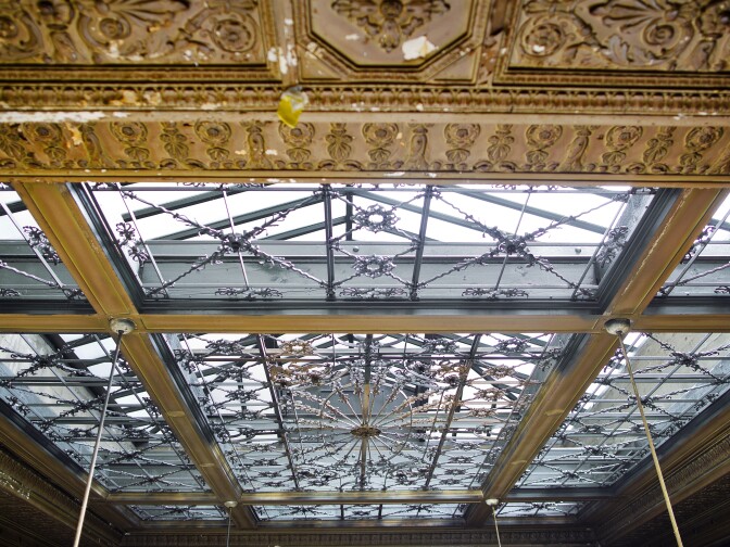 SRO is working to put a common area on the second floor mezzanine, where this ornate ceiling still stands. New common areas will include a TV lounge, computer room, meeting areas and laundry.