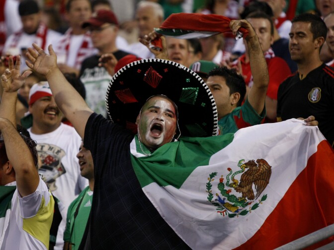 Mexico fans cheer before the start of the Brazil 2014 FIFA World Cup qualifier against USA at Columbus Crew Stadium in Columbus, Ohio, September 10, 2013. USA won 2-0. 
