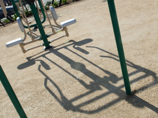 This park contains fitness equipment for the neighborhood.