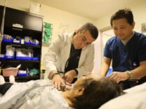 A doctor and an emergency room nurse care for a patient in the ER of Mission Community Hospital on January 28, 2009 in Panorama City, California.