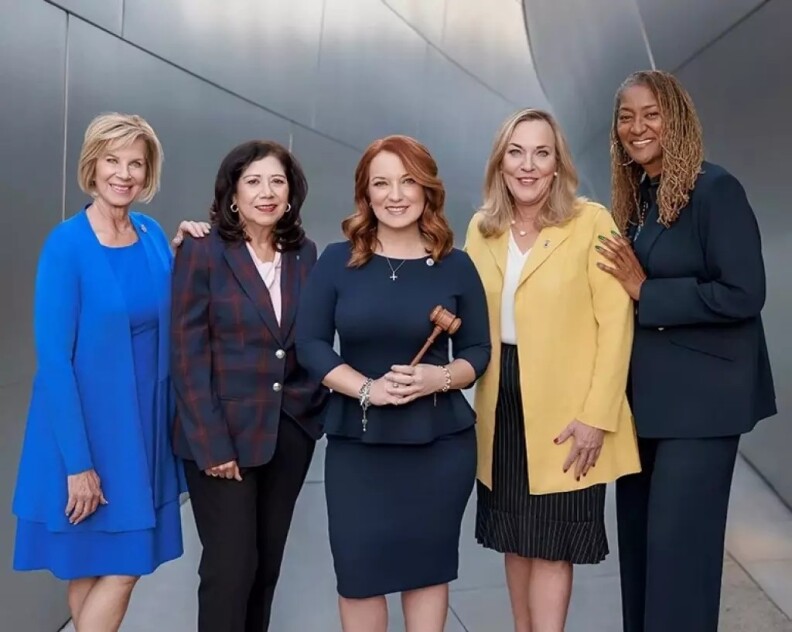 5 women standing