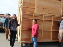 Students at James Monroe High School prepare to unload television flats delivered from Nickelodeon.