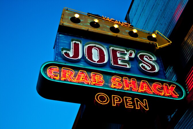 A sign for Joe's Crab Shack is seen in San Francisco, California in this file photo. The restaurant has been piloting a no-tipping policy at 18 of its locations around the U.S.