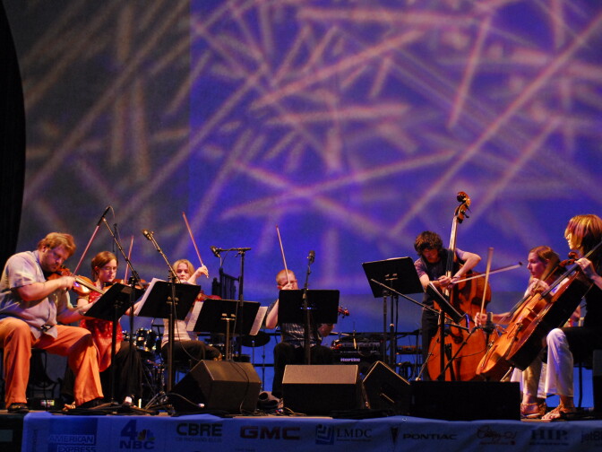 Members of the ensemble Bang on a Can All-Stars perform on stage. They'll be playing Brian Eno's 'Music for Airports' at the San Diego International Airport on Tuesday, October 27