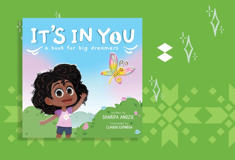 The cover of a book with an illustration of a girl with dark skin tone and curly hair. She wears a pink shirt with purple sleeves and blue shorts. She reaches a hand toward a yellow, purple and pink butterfly. The title is It's In You A Book For Big Dreamers.