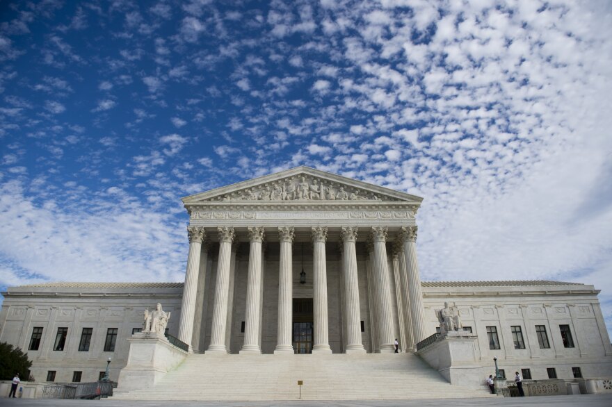 The US Supreme Court in Washington, DC, November 6, 2013. Earlier the Court heard oral arguments in the case of Town of Greece v. Galloway dealing with whether holding a prayer prior to the monthly public meetings in the New York town of Greece violates the Constitution by endorsing a single faith.