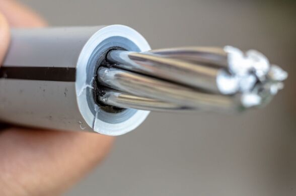 A closeup image of a covered conductor.