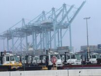 Few striking workers walking the picket lines, but plenty of idle trucks at the APM Terminals at the Port of Los Angeles.