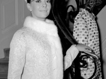 American actress Natalie Wood poses in a Yves Saint Laurent costume, 19 September 1964 in Paris. Wood, the daughter of Russian Immigrants, was born Natasha Gurdin on July 20, 1938 in San Francisco, California. She got her first role at the age of four in a movie called "Happy Land" (1943). She continued playing roles of young girls until the age of 17, where she landed the role of "Judy" in the film "Rebel Without a Cause" (1955). Natalie Wood married Robert Wagner 28 December 1957, divorced in 1962 and later remarried in 1972. She was nominated for two Academy Awards for her roles in "Splendor in the Grass" and "Love With a Proper Stranger". She acted in "West Side Story", a movie which won Oscars for Best Picture, Best Direction, Best Supporting Actors, Best Supporting Actress. Natalie Wood had made 56 films for Tv and the silver screen. She died drowning 29 November 1981.