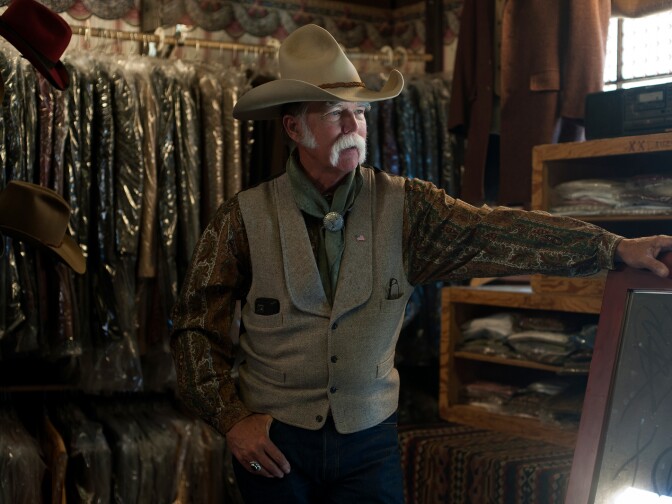 Salesman Doug Oliver for The Old Frontier Clothing Co. works for owner and founder Larry Bitterman, who designs every piece in the store, "down to the buttons," said Bitterman. His clothes are used often for bands, movies and television.