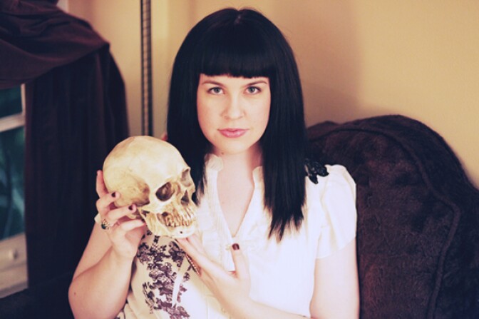 Licensed mortician Caitlin Doughty, star of YouTube's "Ask a Mortician", with skull.