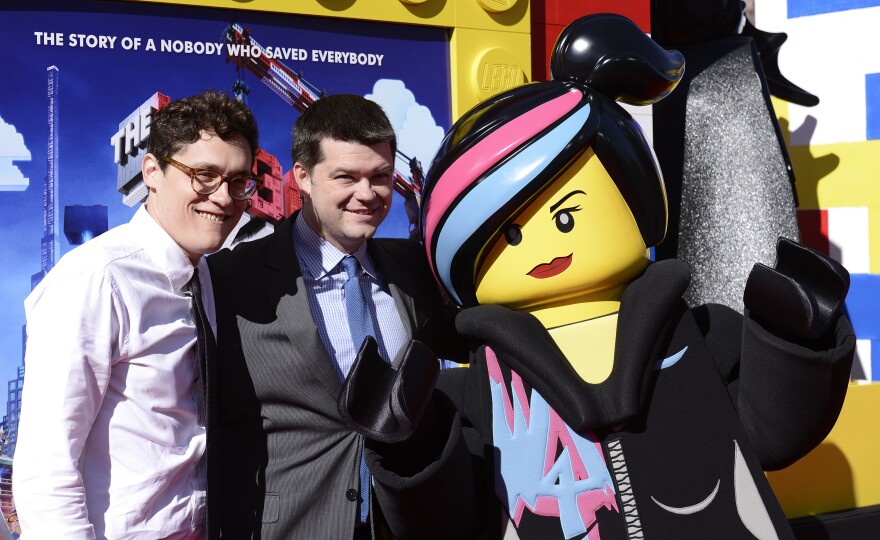 Director Christopher Miller, right, and director Phil Lord seen at the premiere of the feature film "The Lego Movie" on Saturday, Feb. 1, 2014 in Los Angeles. (Photo by Dan Steinberg/Invision/AP)