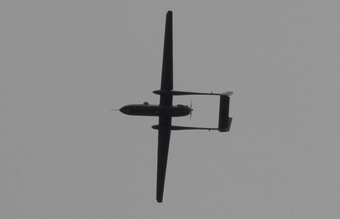 TO GO WITH AFP STORY BY ADEL ZAANOUN.An Israeli drone is seen over Rafah town in the southern Gaza Strip on October 30, 2011.  Israeli drones, linked in the minds of the residents of Gaza to many assassinations of local militant leaders by Israel, are referred to in colloquial Arabic in the impoverished territory as the "zannana" in reference to its deafening noise.  AFP PHOTO/ SAID KHATIB (Photo credit should read SAID KHATIB/AFP/Getty Images)
