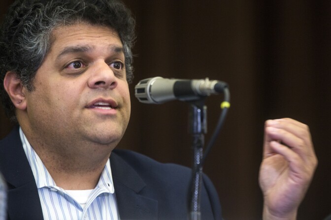 Dr. Cyrus Rangan, director of the Bureau of Toxicology and Environmental Assessment, speaks during a public health meeting at Porter Ranch Community School on Thursday evening, May 19, 2016 following a fall 2015 gas leak that has forced residents from their homes.