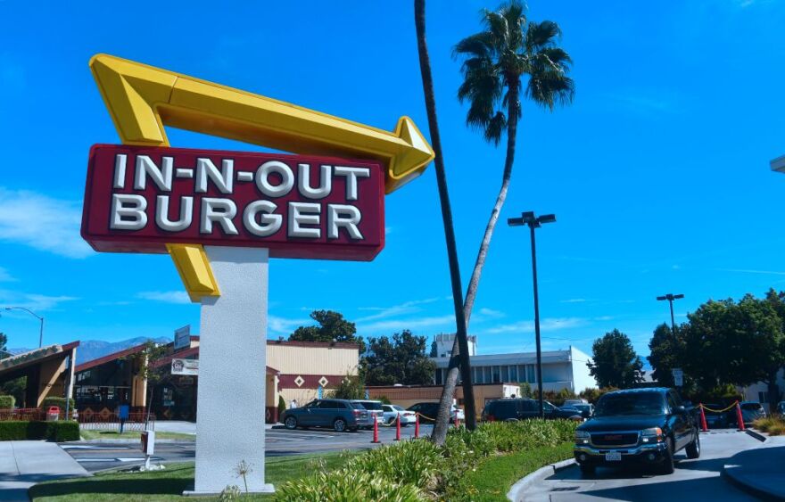 A driver pulls into the drive-thru lane at an In-N-Out Burger restaurant in Alhambra, California on August 30, 2018. - Califoria's Democratic Party Chairman, Eric Bauman, is calling for a boycott of the Irvine, CA based fast food chain after it donated $25,000 to help California Republicans in November. In addition to this week's donation, In-N-Out donated $30,000 to the GOP in 2017 and 2016. (Photo by Frederic J. BROWN / AFP)        (Photo credit should read FREDERIC J. BROWN/AFP/Getty Images)