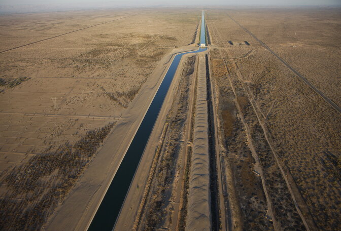 IMPERIAL VALLEY, CA - AUGUST 06:  The All American Canal, the main water conduit from the Colorado River into the Imperial Dam, Imperial Valley, 6 August 2009. The Imperial Valley is a desert area which controversially uses three quarters of Californias allocated river water for agricultural purposes. The agricultural techniques have traditionally been flood and furrow which experts claim waste vast quanties of precious water. Imperial Valley farmers are looking at alternative techniques through which to conserve water supply.  (Photo by Brent Stirton/Getty Images)