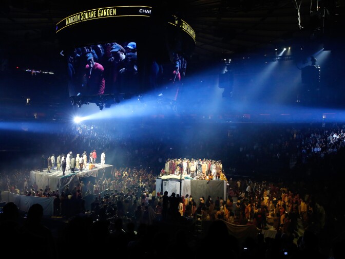 Models pose on multiple stages during Kanye West's release party for "The Life of Pablo" and Yeezy Season 3 at Madison Square Garden in New York City.