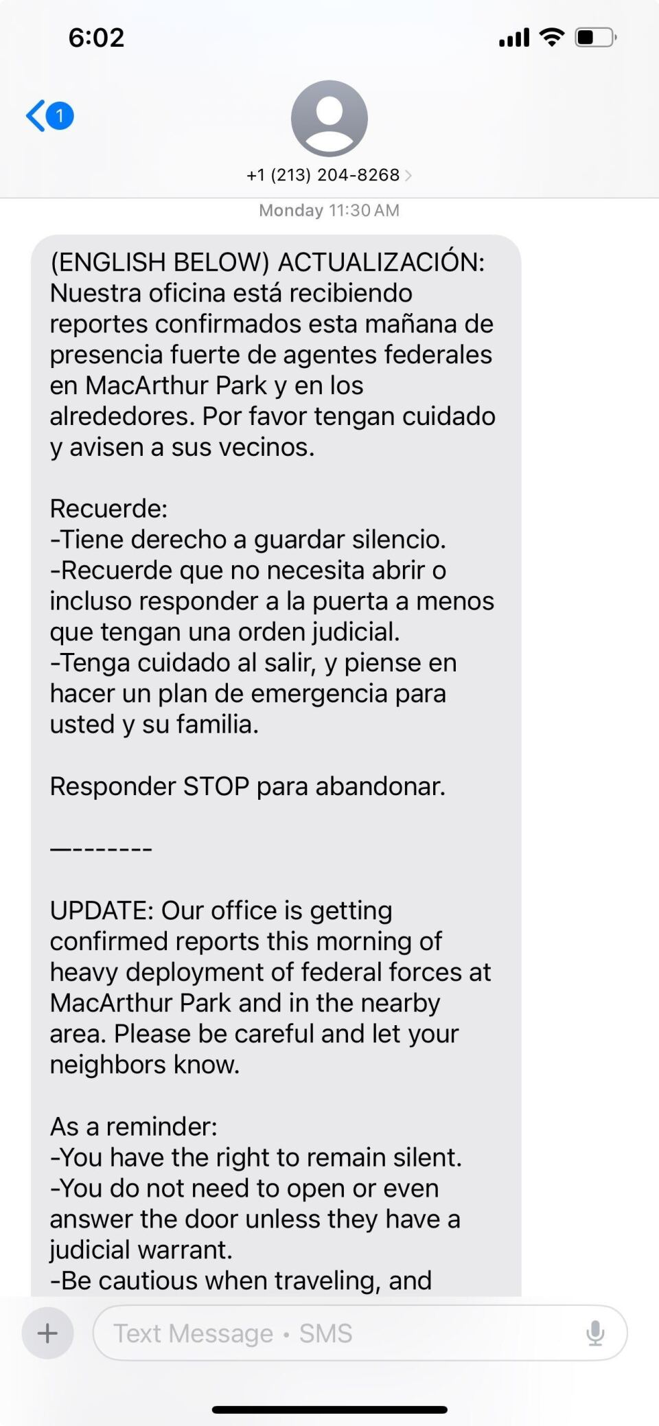 A screenshot shows a gray text message bubble that says immigration enforcement was reportedly seen at MacArthur Park and reminding residents of their rights. 