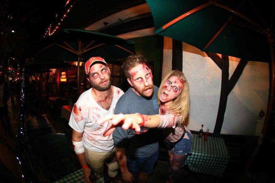 Dressing like a zombie is required for this annual pub crawl.