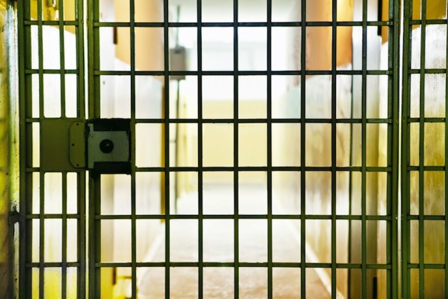 prison-cell-bars-door.jpg
