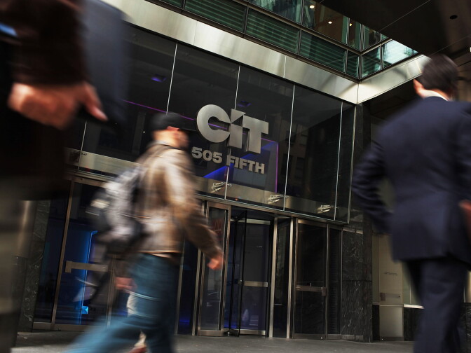 File: People walk by the headquarters of CIT Group on Nov. 2, 2009 in New York City.