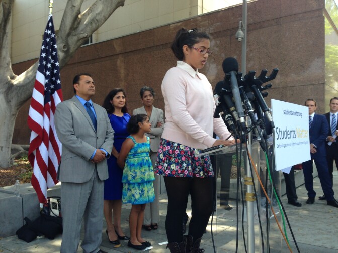 In this file photo, Julia Macias, one of nine plaintiffs in the Vergara v. California trial, welcomes a judge's ruling in June striking down teacher job protections.