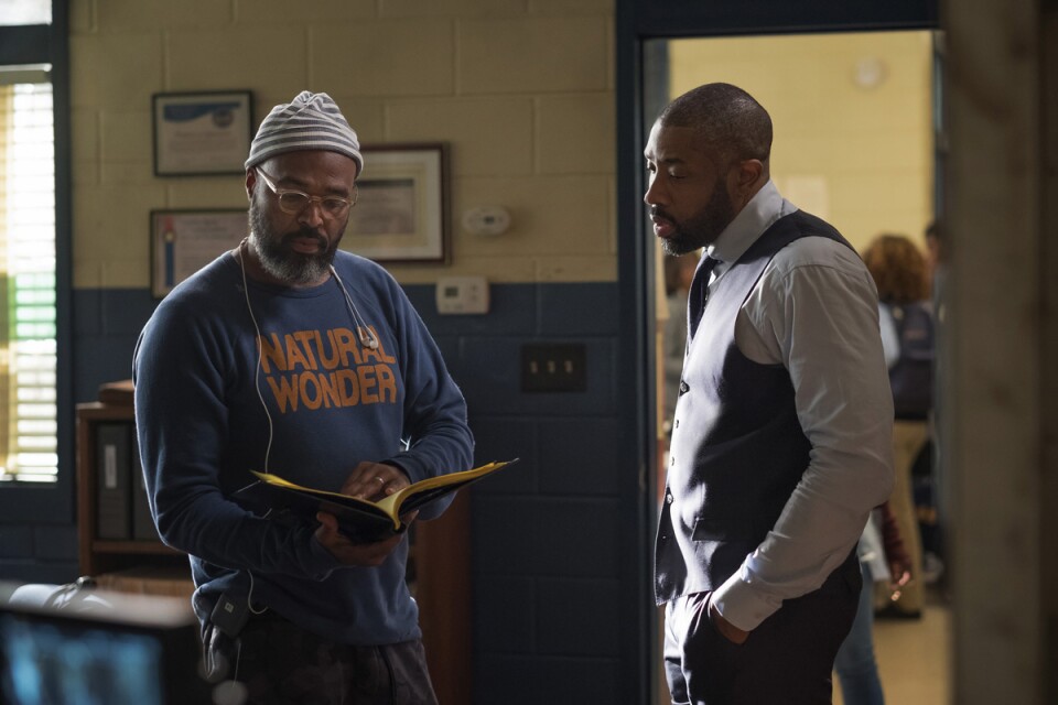 Black Lightning -- "The Resurrection" -- Image BLK101H_BTS_0014.jpg -- Pictured (L-R): Executive Producer Salim Akil and Cress Williams as Jefferson Pierce -- Photo: Mark Hill/The CW -- © 2018 The CW Network, LLC. All rights reserved.