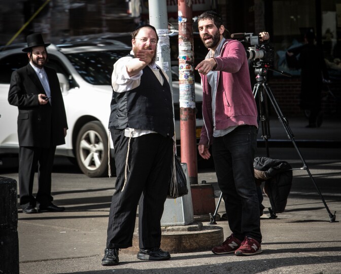 Menashe Lustig and Joshua Z. Weinstein on set of "Menashe." Weinstein spoke with The Frame about making the film.
