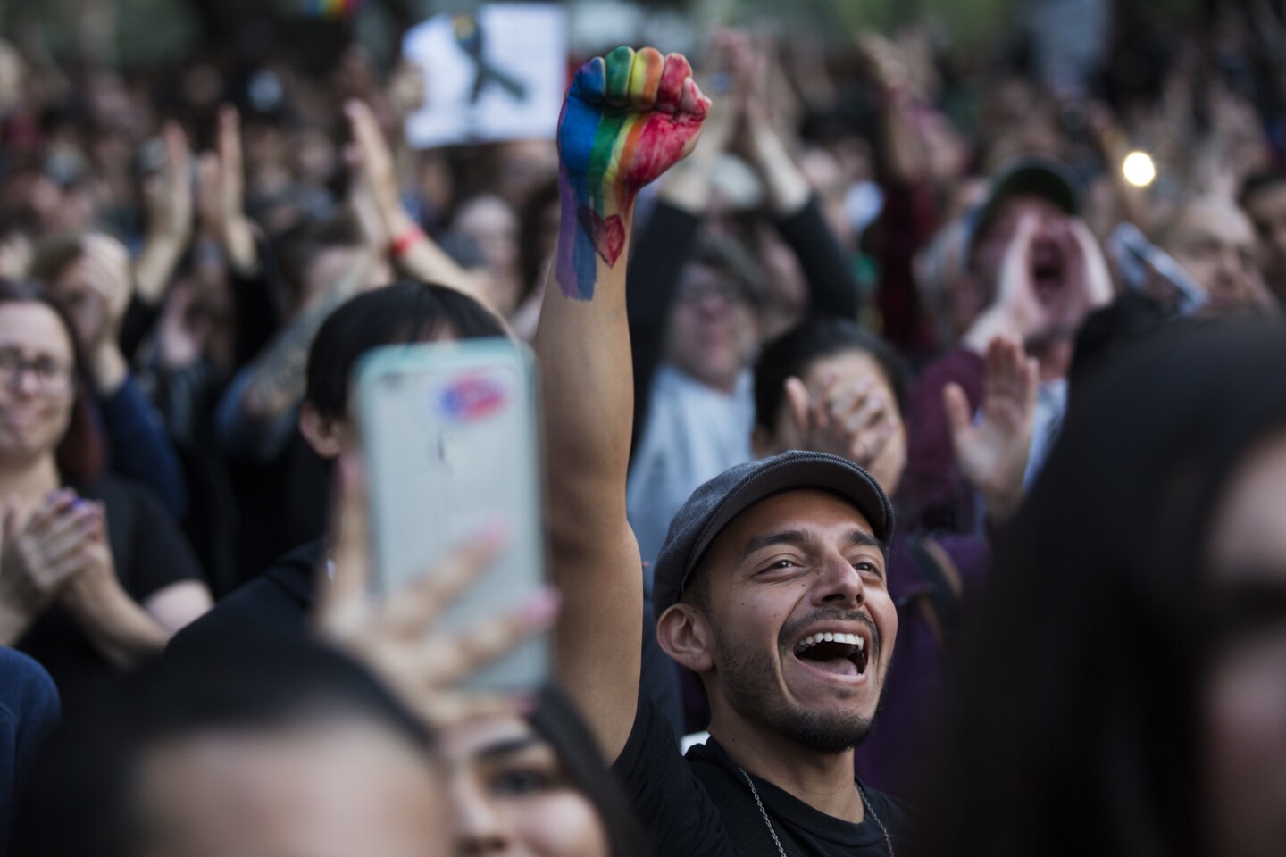 Thousands attend a vigil on Monday, June 13, 2016 at Los Angeles City Hall memorializing those who died in Sunday's attack in Orlando.
