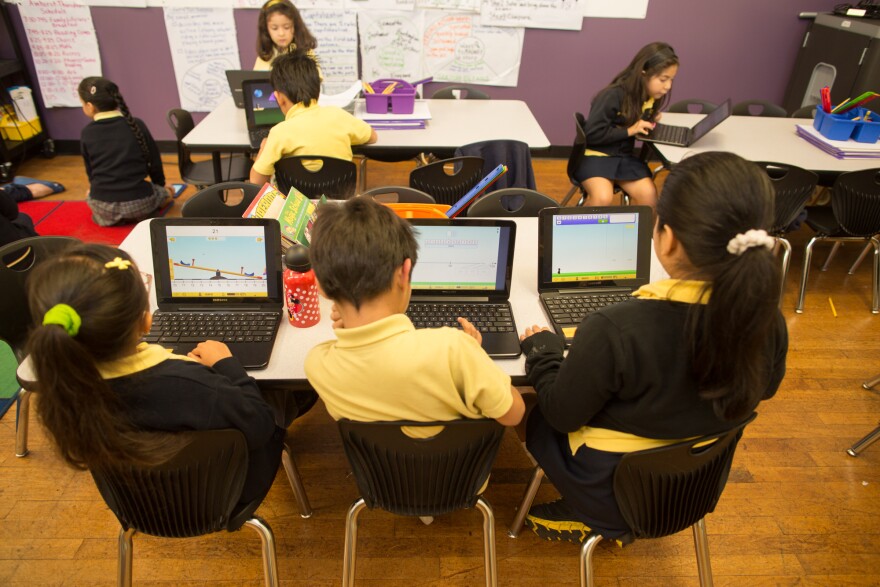 Komienza Community Prep in Huntington Park rotates Chromebooks and iPads between groups of students so everyone gets a turn.