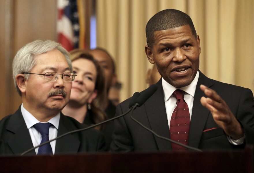 San Francisco Police Chief William Scott, right, speaks next to Mayor Ed Lee at a news conference in San Francisco, Tuesday, Dec. 20, 2016. San Francisco appointed Scott, a deputy chief of the Los Angeles Police Department, to head the city police department as it deals with a number of racially charged issues.