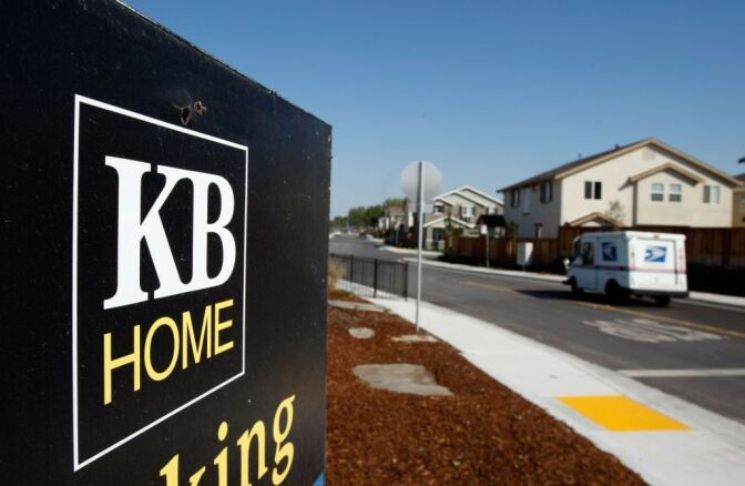 The Commerce Department Tuesday reported that U.S. builders began construction on more single-family homes and apartments in May, encouraged by more buyers and a scarcity of houses for sale. (Photo: A sign is seen outside of a KB Home sales center in California).
