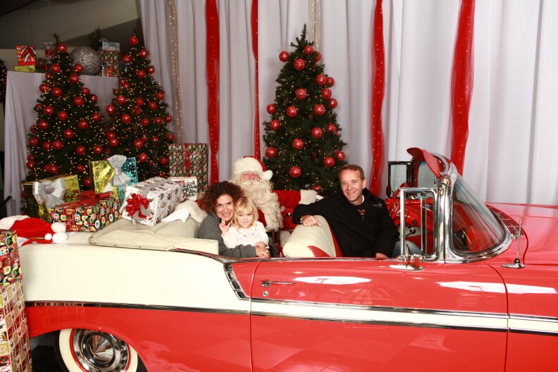 Take Two host Alex Cohen and her family pose for a photo with Santa.