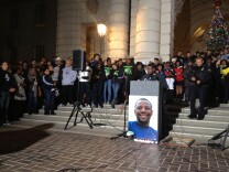 About 400 people gathered at Pasadena City Hall Thursday evening for a memorial in honor of Victor McClinton, a youth sports mentor killed Christmas morning.
