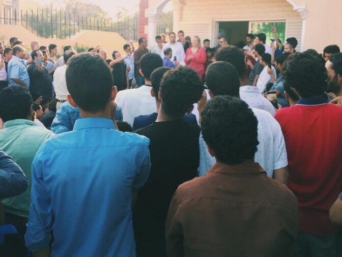 Immigrants seeking to enter the U.S. listen to attorney Julie Ann Goldberg at her office in the country of Djibouti in east Africa on Jan. 31, 2017. Twenty-eight Yemenis she represents won a court order Tuesday from a Los Angeles-based federal judge temporarily stopping the enforcement of the Trump travel ban on those holding immigrant visas.