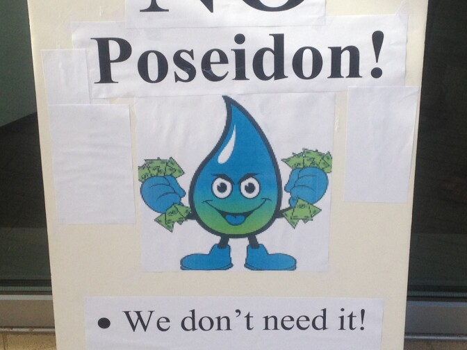 A sign spells out opposition to Poseidon Water and its plans to build a desalination plant in Huntington Beach. 