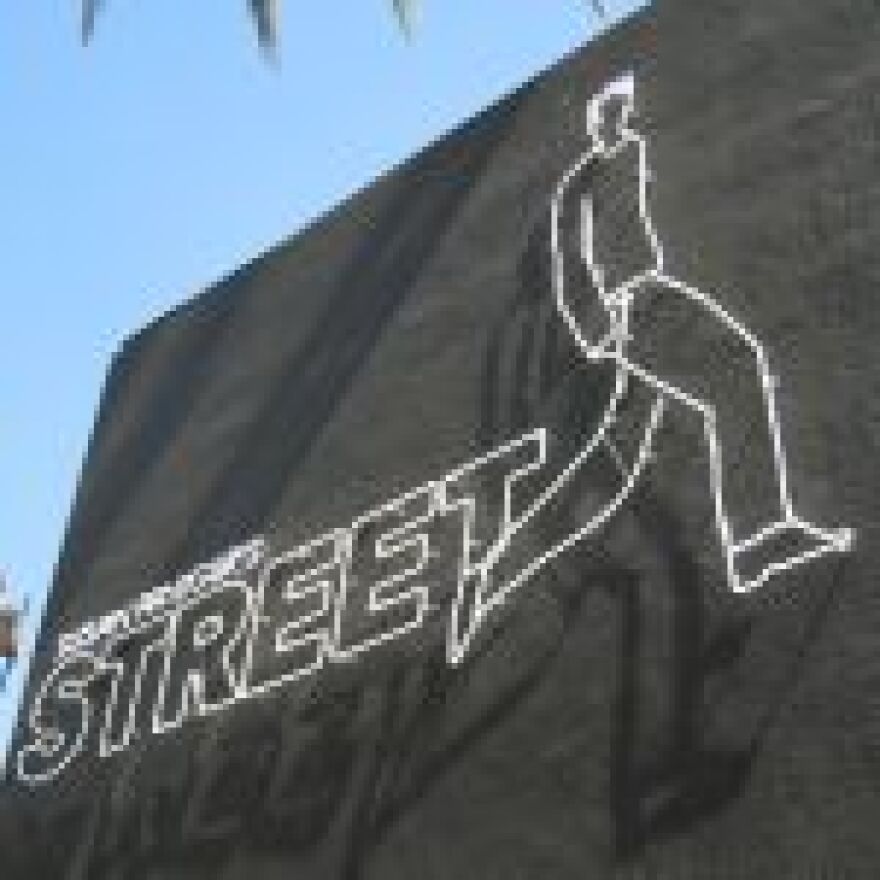 susan-fenigers-neon-street-restaurant-sign.jpg