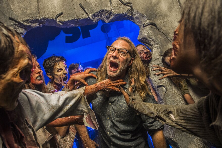 Greg Nicotero, Co-Executive Producer and Director of Special Effects Make-Up Artist for AMC's "The Walking Dead," found himself surrounded by a horde of walkers at Universal Orlando's Halloween Horror Nights 24 on October 25, 2014 in Orlando, Florida. 