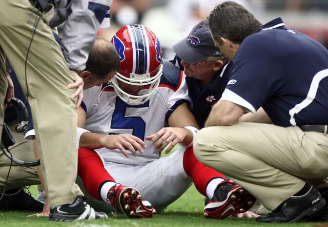 Starting Quarterback Trent Edwards #5 of the Buffalo Bills suffers a concussion after getting hit by Strong Safety Adrian Wilson #24 of the Arizona Cardinals during the first half of their NFL game on Oct. 5, 2008 at Stadium in Glendale, Arizona.